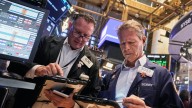 Stock market climbs as shutdown fears loom