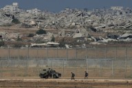 Israeli troops kill at least 31 Palestinians in Gaza as Trump peace proposal raises questions