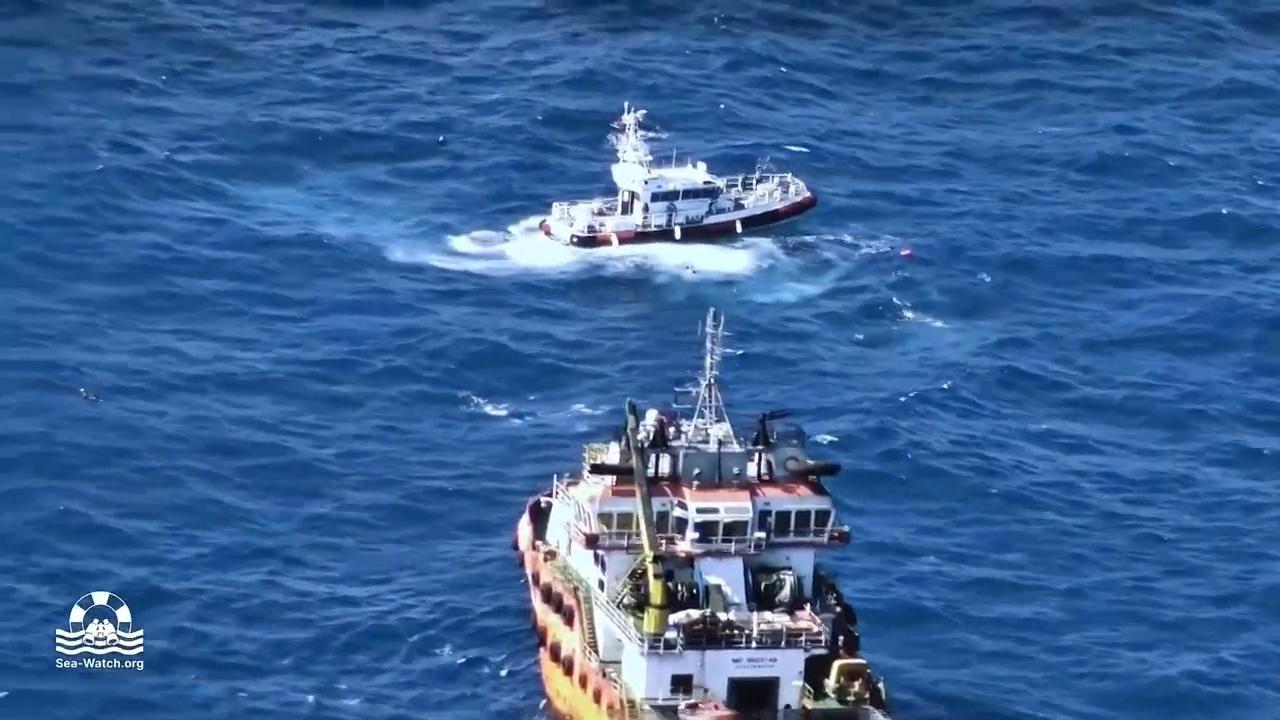 NGO footage shows overcrowded dinghy and migrants in water off Libya