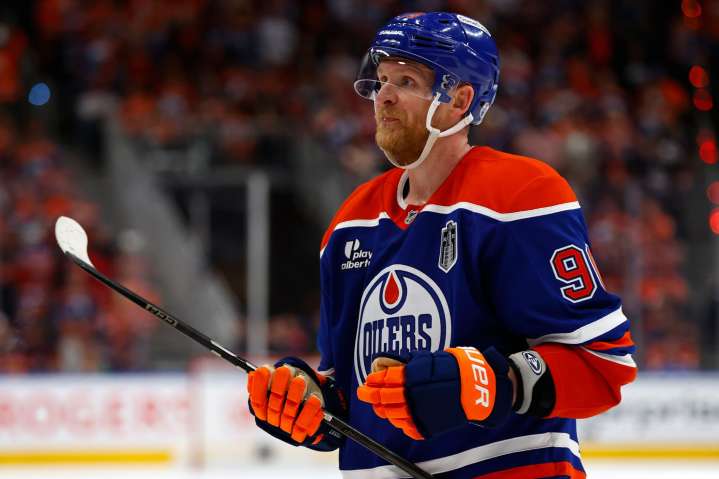 Ex-Edmonton Oilers winger Corey Perry removed from ice in wheelchair after injury: report
