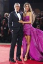 Red carpet fashion in vertical at the Venice Film Festival