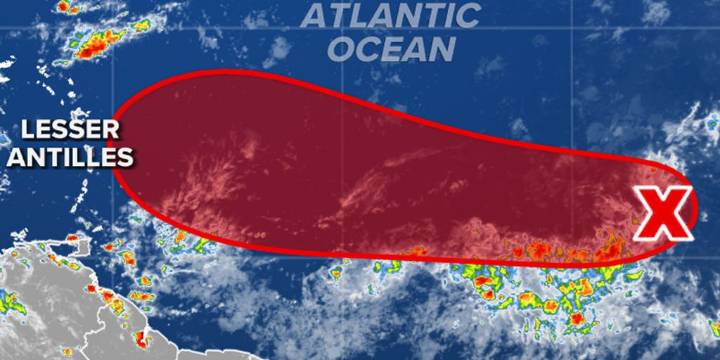 Invest 91L enters less favorable environment for development