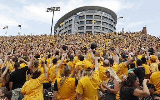 College football traditions: ‘Hawkeye Wave’ bonds everyone in stadium with kids in adjacent hospital