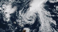 Kiko weakens into a tropical storm but brings dangerous surf to Hawaii
