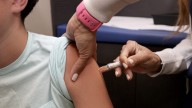 Covid shots for low-income children stymied by approval delay