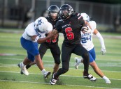 See our 7 favorite photos as Jackson Northwest football battles Adrian