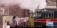 Train hits back of Moline ladder truck at fire