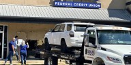 Police officer hurt, car crashes into credit union in Pineville