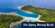 Travel quiz: What is the largest island shared by multiple countries?