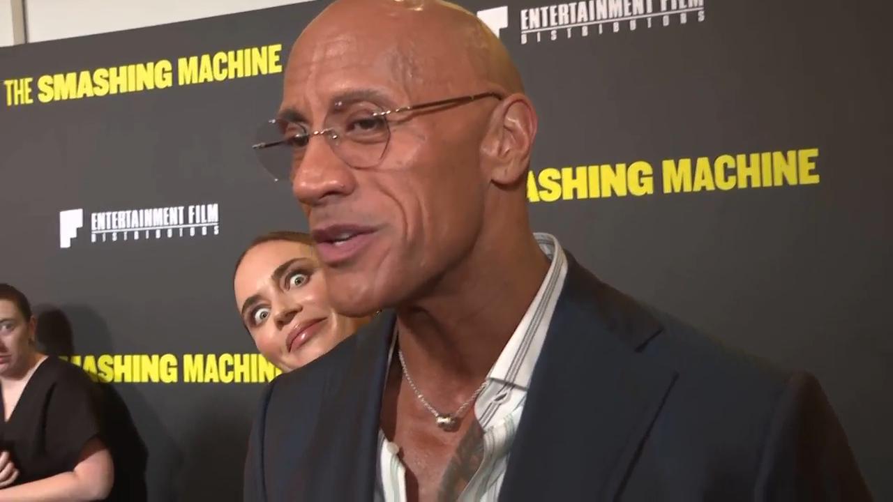 Emily Blunt interrupts Dwayne Johnson red carpet interview