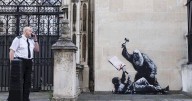 New Banksy mural of a judge beating a protester to be removed from outside London court