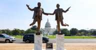 A statue of Trump and Epstein holding hands in D.C. is removed as fast as it appeared