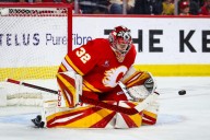 Flames Sign Dustin Wolf To Seven