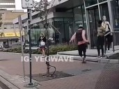 Edmonton police seek victim and witness in caught-on-video Jasper Avenue phone snatching
