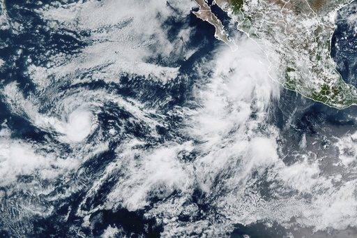Lorena becomes a hurricane off the western coast of Mexico as Kiko travels over open waters