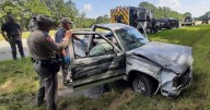 Driver injured when his pickup truck went off a highway and hit a tree