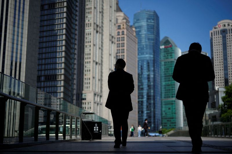 Some Chinese firms pretend to comply with mandated social insurance payments as business struggles