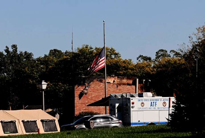 American flag at half-staff stands as powerful image after Michigan church mass killing