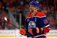 Ex-Edmonton Oilers winger Corey Perry removed from ice in wheelchair after injury: report