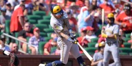 Brewers clinch NL Central despite 5-1 loss to Herrera and the Cardinals