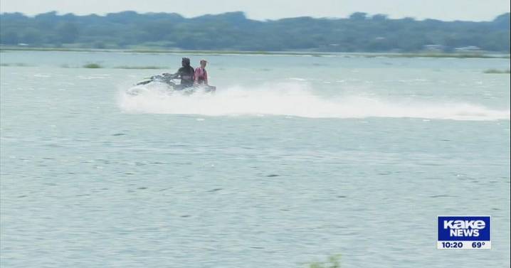 Labor Day weekend campers enjoy a full Cheney Lake for the first time in years