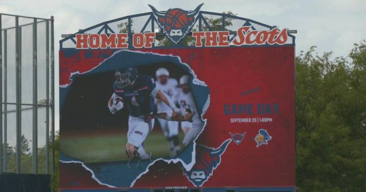 Macalester football battles for repossession of the "Book of Knowledge"