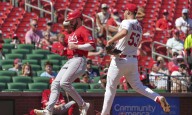 Reds beat Cards 6-2, cling to wild card hopes