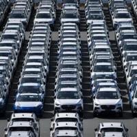 Trump signs order to lower US tariffs on Japan autos to 15%