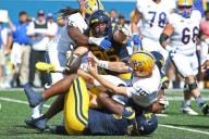 West Virginia beats Pitt in Backyard Brawl on Tye Edwards’ short TD run in OT