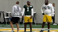 Micah Parsons, wearing Curly Lambeau’s No. 1, debuts at…