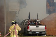 Police still on scene of Michigan church after shooting, fire left 4 dead, 8 wounded