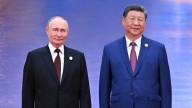 Xi and Putin stand shoulder to shoulder as China casts itself as an alternative global leader