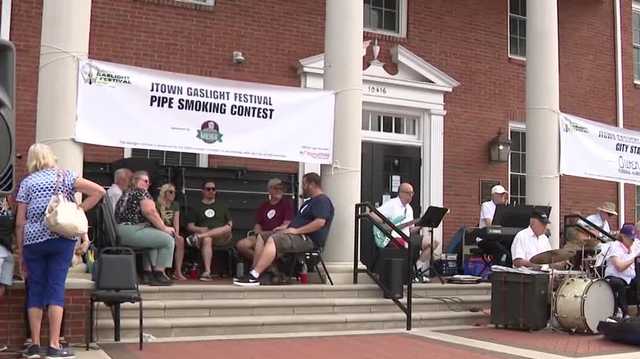 Putting out the competition at the Gaslight Festivals Pipe Smoking Competition