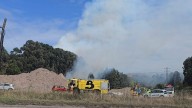 Alarma por un fuego en la margen derecha de la ría de Avilés