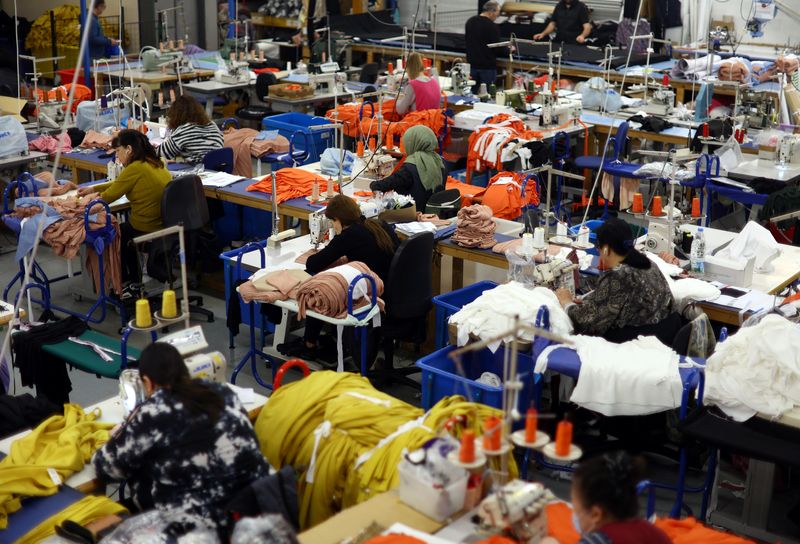 UK factories downturn eases but tax hike concerns persist, CBI says