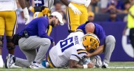LSU starting center Braelin Moore could miss time with an ankle injury. Here's the latest.