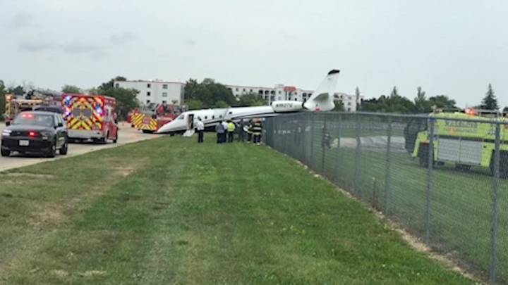 Plane crashes through fence at suburban Wheeling airport