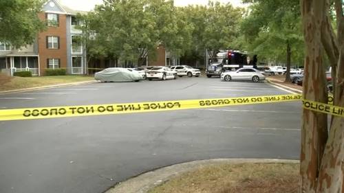 Woman found dead inside Durham apartment; man in custody