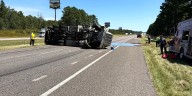 Tanker flips over, closing eastbound I