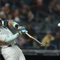 Yankees' Judge surpasses 50 homers for record