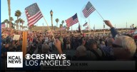 Thousands gather on Huntington Beach Pier for vigil in remembrance of Charlie Kirk