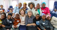 President Porter and Sister Dennis minister in Africa South Area, see love and service