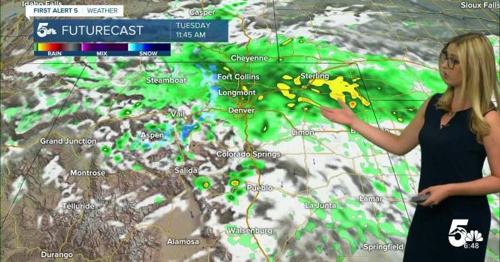 Much cooler Tuesday with rain showers, snow over the mountain passes