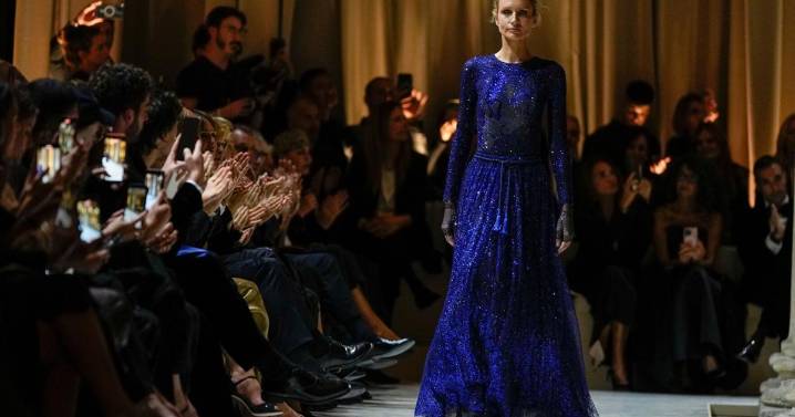 Armani's last collection shown in solemn runway show with Richard Gere, Lauren Hutton in 1st row