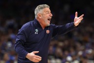 Auburn basketball coach Bruce Pearl steps down; son Steven taking over on five