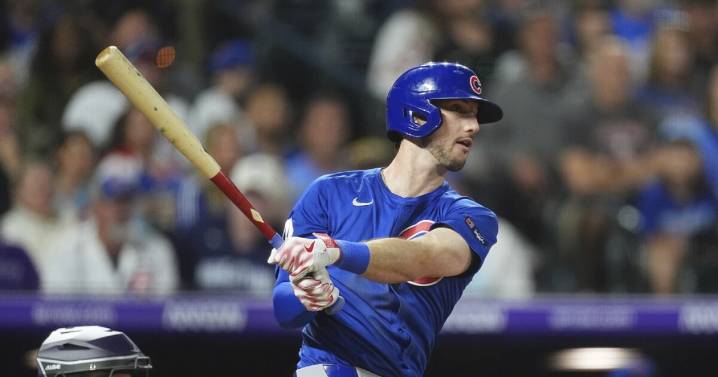 Tucker and Assad power Cubs to a 4-3 win over the Rockies on Saturday
