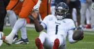 Denver's defense swarms top overall draft pick as Titans' Cam Ward loses NFL debut