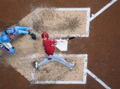 Reds overtake Mets for NL's 3rd wild-card spot by beating Brewers 3