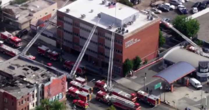 Fire crews battle flames at East Hollywood business college building