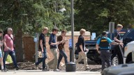 Report says school shooting suspect was fascinated with mass shootings and expressed neo